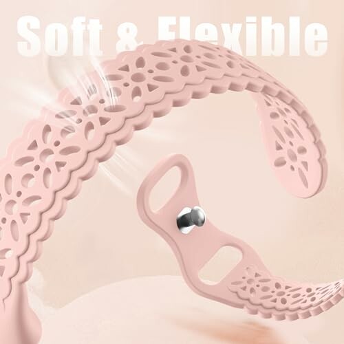 Soft and flexible pink headband with floral design.